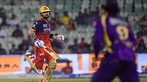 (AP Photo/Abhijit Addya) : Royal Challengers Bengaluru's Virat Kohli run between the wickets during the Indian Premier League cricket match between Royal Challengers Bengaluru and Kolkata Knight Riders in Raipur, India, Wednesday, May 13, 2026