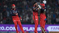 RCB Vs KKR Toss Update, IPL 2026: Bengaluru Bowling First - Check Playing XIs | Photo: AP/Manish Swarup : Royal Challengers Bengaluru's Bhuvneshwar Kumar, second left, celebrate with teammates the wicket of Delhi Capitals' captain Axar Patel, left, during the Indian Premier League cricket match between Delhi Capitals and Royal Challengers Bengaluru in Delhi.