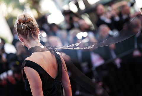Poppy Delevingne poses for photographers at the the opening ceremony and premiere of the film 'The Electric Kiss' during 79th international film festival, Cannes, southern France.