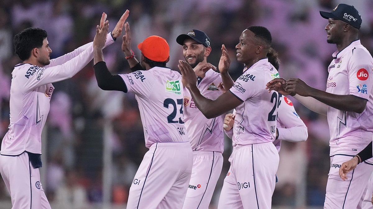 Gujarat Titans' Kagiso Rabada, second right, and others celebrate the wicket of Sunrisers Hyderabad's Smaran Ravichandran during the Indian Premier League cricket match between Gujarat Titans and Sunrisers Hyderabad, in Ahmedabad, India, Tuesday, May 12, 2026.  - | Photo: AP/Ajit Solanki