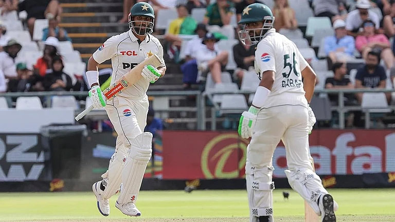 SA vs PAK 2nd Test Day 3: Pakistan's Shan Masood (c) and Pakistan's Babar Azam run between the wickets - | Photo: AP/Halden Krog
