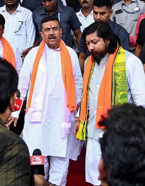 West Bengal Chief Minister Suvendu Adhikari with state Cabinet Minister Nisith Pramanik after the oath-taking ceremony of the newly-elected MLAs in the state Legislative Assembly, in Kolkata.