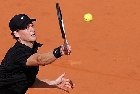 Italy's Jannik Sinner returns the ball to Italy's Andrea Pellegrino, during their match at the Italian Open tennis tournament in Rome.