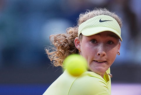 Mirra Andreeva of Russia returns to Coco Gauff of the United States during their match at the Italian Open tennis tournament in Rome.