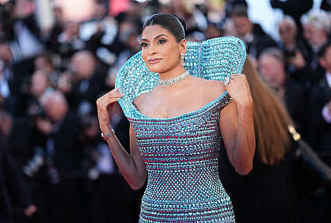 Farhana Bodi poses for photographers at the opening ceremony and premiere of the film 'The Electric Kiss' during 79th international film festival, Cannes, southern France.
