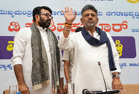 Karnataka Deputy Chief Minister DK Shivakumar and Bangalore Development Authority (BDA) Chairman NA Haris during a press conference regarding the announcement of various initiatives, in Bengaluru.