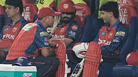 PBKS Vs MI Preview, IPL 2026: Plummeting Punjab Kings Look To Arrest Slide Against Eliminated Mumbai Indians Photo: AP/Ashwini Bhatia : Punjab Kings' coach Ricky Ponting, squatting left, speaks to Punjab Kings' openers Prabhsimran Singh, center, and Priyansh Arya before the Indian Premier League cricket match between Delhi Capitals and Punjab Kings in Dharamshala, India.