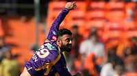 RCB Vs KKR, IPL 2026: Is Varun Chakravarthy Playing Today's Indian Premier League 2026 Match? | Photo: AP/Mahesh Kumar A. : Kolkata Knight Riders' Varun Chakaravarthy bowls a delivery during the Indian Premier League cricket match between Sunrisers Hyderabad and Kolkata Knight Riders in Hyderabad.