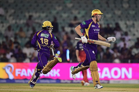 Kolkata Knight Riders' Cameron Green, right, and his batting partner Angkrish Raghuvanshi run between the wickets during the Indian Premier League cricket match between Royal Challengers Bengaluru and Kolkata Knight Riders in Raipur, India,.