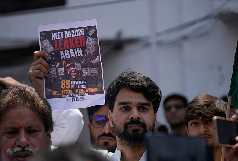 The cancellation led to a Central Bureau of Investigation (CBI) probe, while officials have sought to ensure the integrity of the fresh examination. - | Photo: AP/Channi Anand