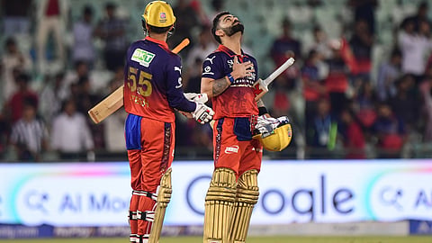 Royal Challengers Bengaluru's Virat Kohli, right, reacts as his batting partner Jitesh Sharma llooks on after winning the Indian Premier League cricket match between Kolkata Knight Riders and Royal Challengers Bengaluru in Raipur, India, Wednesday, May 13, 2026