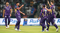 RCB VS KKR Live Score, IPL 2026: Toss Delayed Due To Rain In Crucial Raipur Clash | Photo: AP/Manish Swarup : Kolkata Knight Riders' Kartik Tyagi, second left, celebrates with teammates the wicket of Delhi Capitals' KL Rahul during the Indian Premier League cricket match between Delhi Capitals and Kolkata Knight Riders in New Delhi, India.