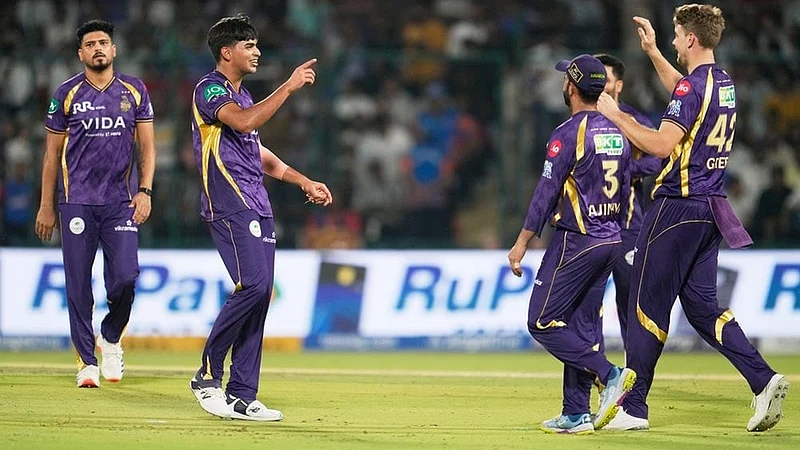 | Photo: AP/Manish Swarup : Kolkata Knight Riders Kartik Tyagi, second left, celebrates with teammates the wicket of Delhi Capitals KL Rahul during the Indian Premier League cricket match between Delhi Capitals and Kolkata Knight Riders in New Delhi, India.