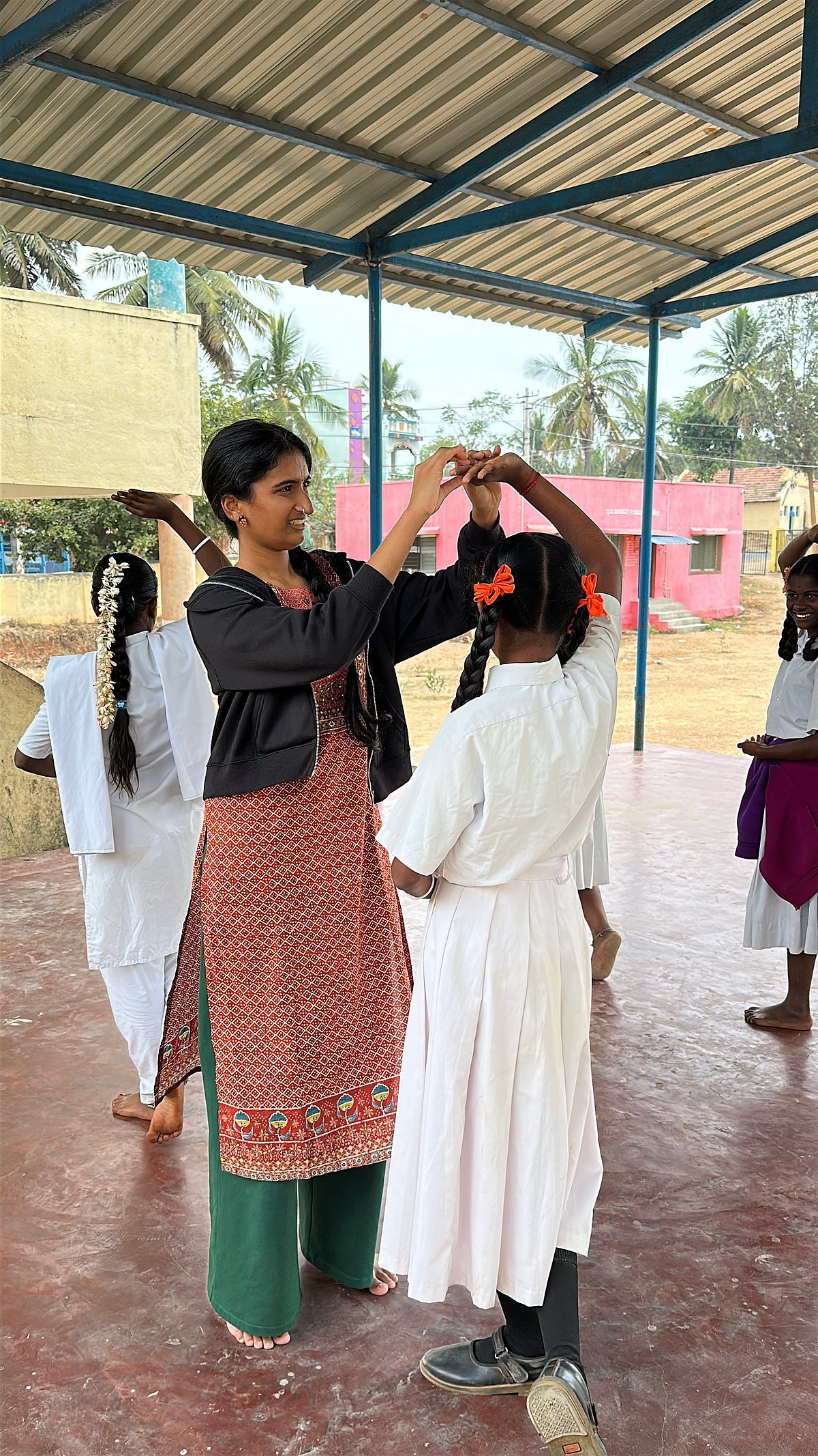 Saanvi Raghavendran teaching a young student