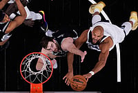 San Antonio Spurs Vs Minnesota Timberwolves, NBA 2026: Spurs Take 3-2 Series Lead With Game 5 Win | Photo: AP/Eric Gay : Minnesota Timberwolves center Rudy Gobert, right, drives to the basket against San Antonio Spurs center Luke Kornet, left, during the second half of Game 5 of an NBA basketball second-round playoffs series in Minneapolis.
