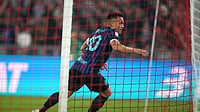 AP Photo : Inter Milan's Lautaro Martinez celebrates after scoring his side's second goal during the Italian Cup soccer final between Lazio and Inter Milan, in Rome.