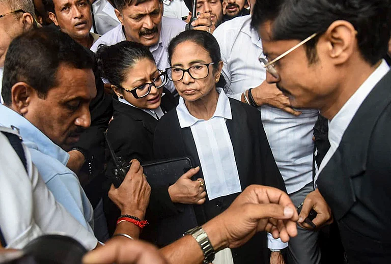 Former West Bengal chief minister and TMC supremo Mamata Banerjee leaves after appearing before the Calcutta High Court to argue a case in connection with alleged post-poll violence and attacks on party offices, in Kolkata. - | Photo: PTI