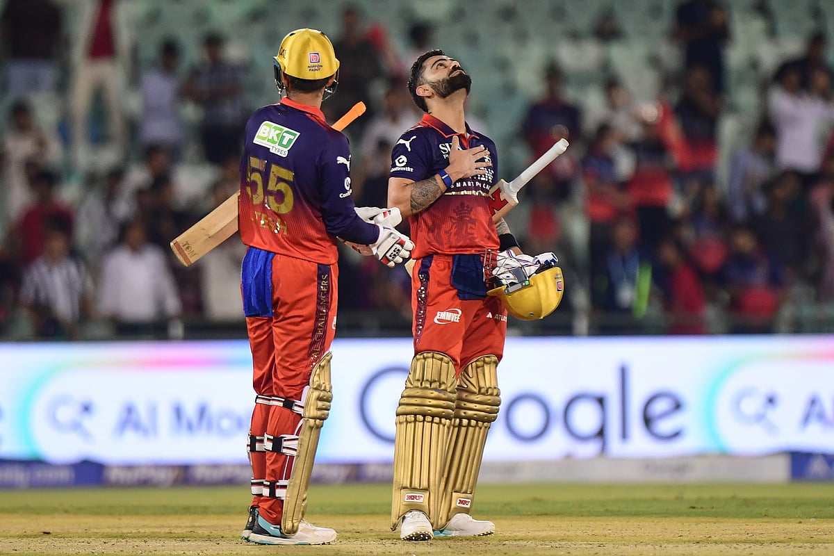 Royal Challengers Bengaluru's Virat Kohli, right, reacts as his batting partner Jitesh Sharma llooks on after winning the Indian Premier League cricket match between Kolkata Knight Riders and Royal Challengers Bengaluru in Raipur, India, Wednesday, May 13, 2026. - | Photo: AP/Abhijit Addya