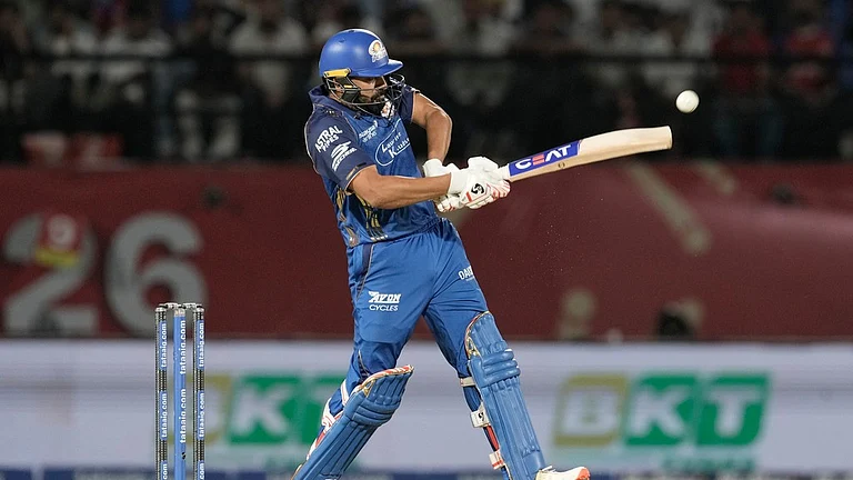 Mumbai Indians' Rohit Sharma plays a shot during the Indian Premier League cricket match between Punjab Kings and Mumbai Indians in Dharamshala, India, Thursday, May 14, 2026. - AP Photo/Ashwini Bhatia