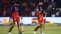 | PhotoL AP/Abhijit Addya : Royal Challengers Bengaluru's Virat Kohli, right, and batting partner Jitesh Sharma leave the field after winning the Indian Premier League cricket match between Kolkata Knight Riders and Royal Challengers Bengaluru in Raipur, India, Wednesday, May 13, 2026.