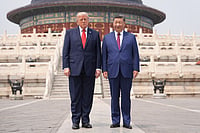 Mark Schiefelbein : President Donald Trump, left, stands with Chinese President Xi Jinping at the Temple of Heaven on Thursday May 14, 2026, in Beijing. 