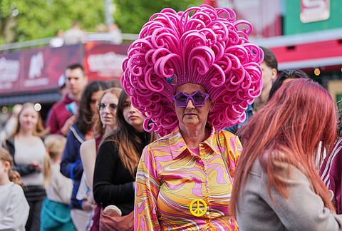 Music fans line up in Eurovision Village during the 70th Eurovision Song Contest week in Vienna, Austria.