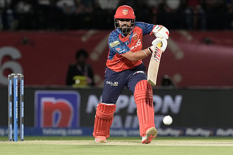 Punjab Kings' Prabhsimran Singh plays a shot during the Indian Premier League cricket match between Punjab Kings and Mumbai Indians in Dharamshala, India.