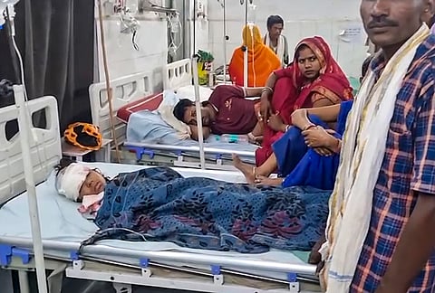 Injured victims admitted in a hospital after a strong storm and heavy rain caused damage to the pontoon bridge at Rampur Ganga Ghat, in Bhadohi, Uttar Pradesh.