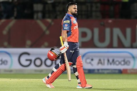 Punjab Kings' Prabhsimran Singh reacts as he walks off the field after losing his wicket during the Indian Premier League cricket match between Punjab Kings and Mumbai Indians in Dharamshala, India.