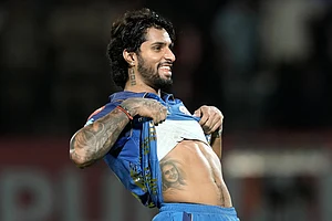 (AP Photo/Ashwini Bhatia) : Mumbai Indians' Tilak Varma celebrates after their win in the Indian Premier League cricket match against Punjab Kings in Dharamshala, India, Thursday, May 14, 2026
