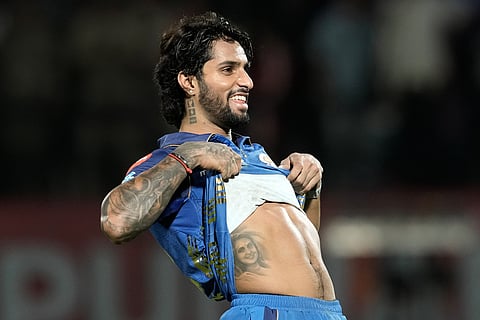 Mumbai Indians' Tilak Varma celebrates after their win in the Indian Premier League cricket match against Punjab Kings in Dharamshala, India, Thursday, May 14, 2026