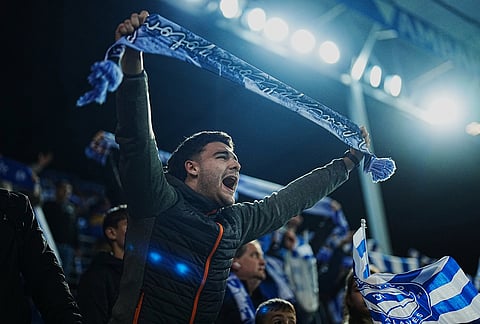 Alaves fans celebrate after the Spanish La Liga soccer match between Alaves and Barcelona in Vitoria-Gasteiz, Spain.