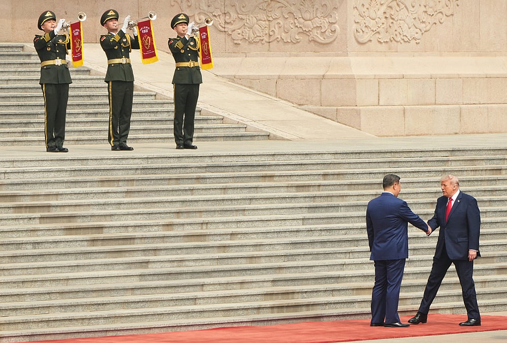 Donald Trump greets Xi Jinping in Beijing