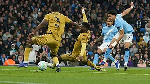 | Photo: AP/Ian Hodgson : Manchester City's Omar Marmoush, right, scores his side's second goal during the English Premier League soccer match between Manchester City and Crystal Palace in Manchester, England.