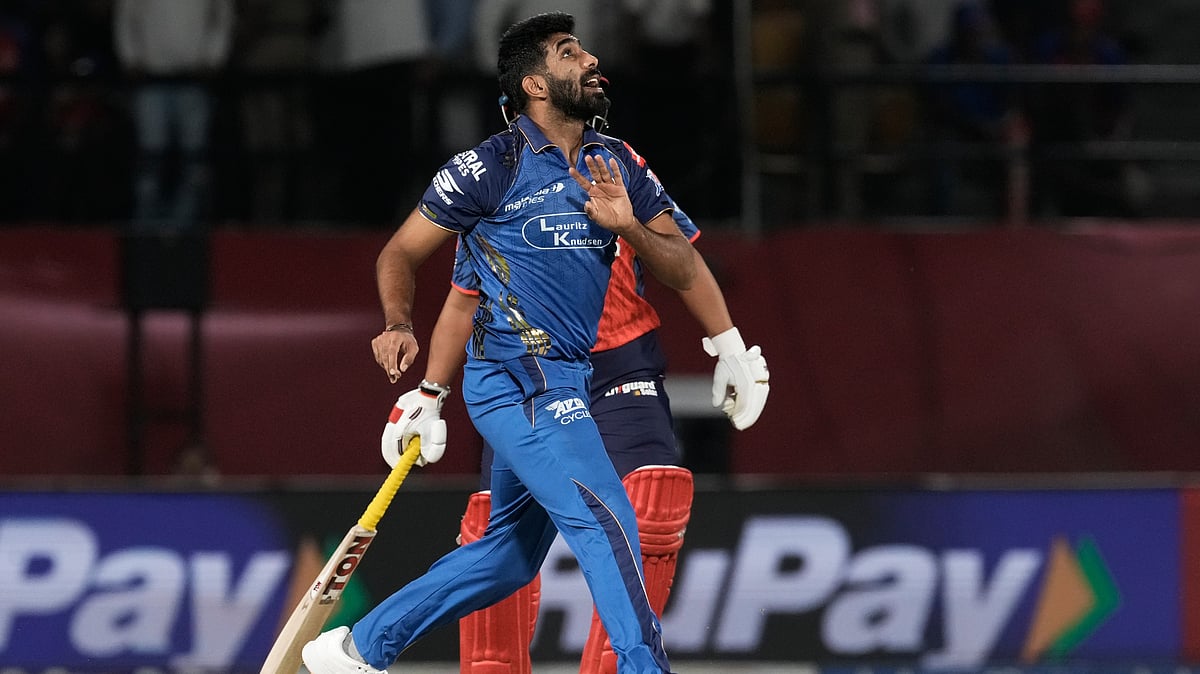 Mumbai Indians' captain Jasprit Bumrah reacts after bowling a delivery during the Indian Premier League cricket match between Punjab Kings and Mumbai Indians in Dharamshala. - AP Photo
