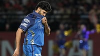 AP Photo : Mumbai Indians' Shardul Thakur reacts after taking the wicket of Punjab Kings' Marco Jansen during the Indian Premier League cricket match between Punjab Kings and Mumbai Indians in Dharamshala.