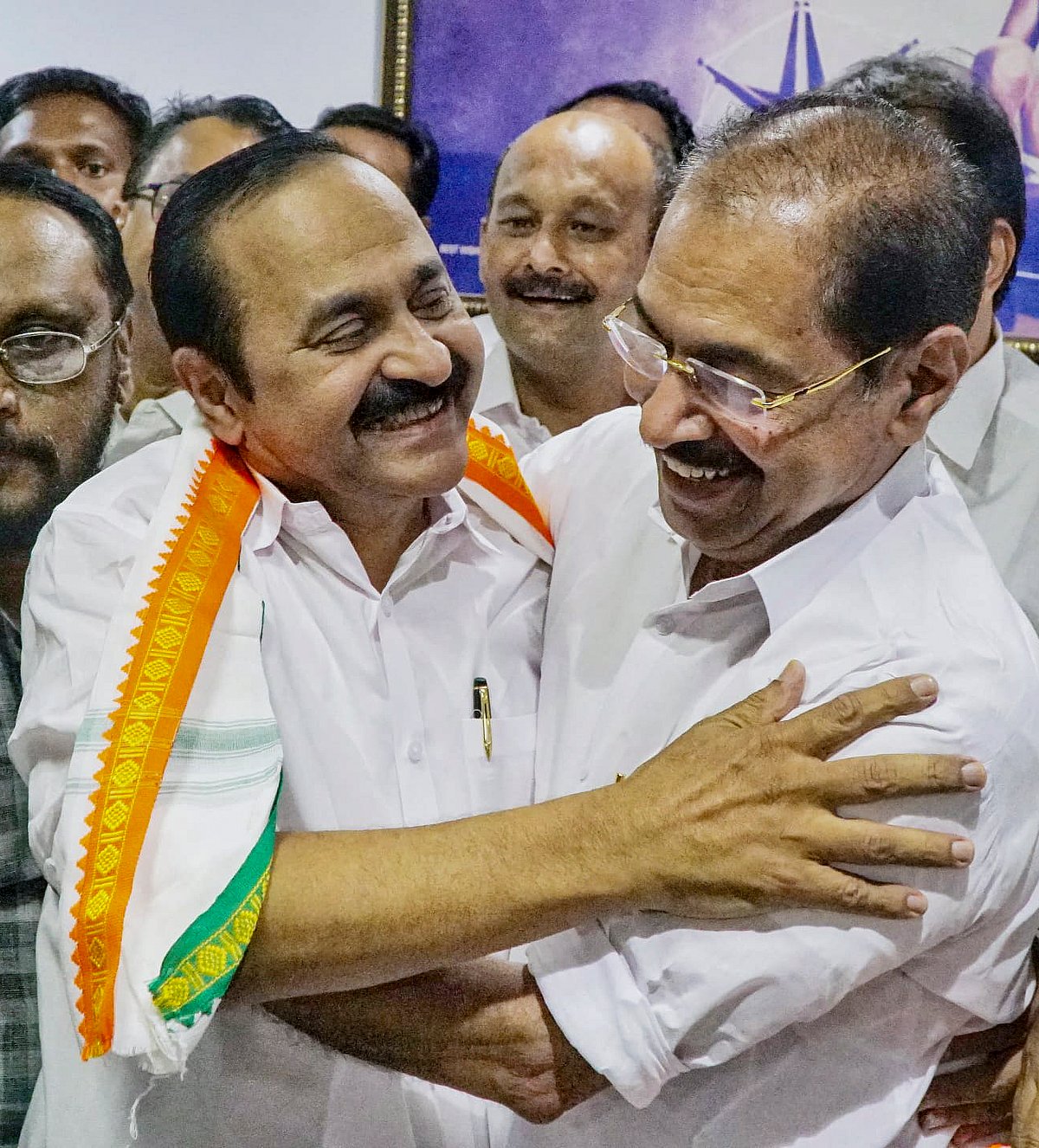 KPCC President Sunny Joseph greets party leader VD Satheesan after the latter was announced as the next Chief Minister of Kerala, at KPCC office, in Thiruvananthapuram - PTI