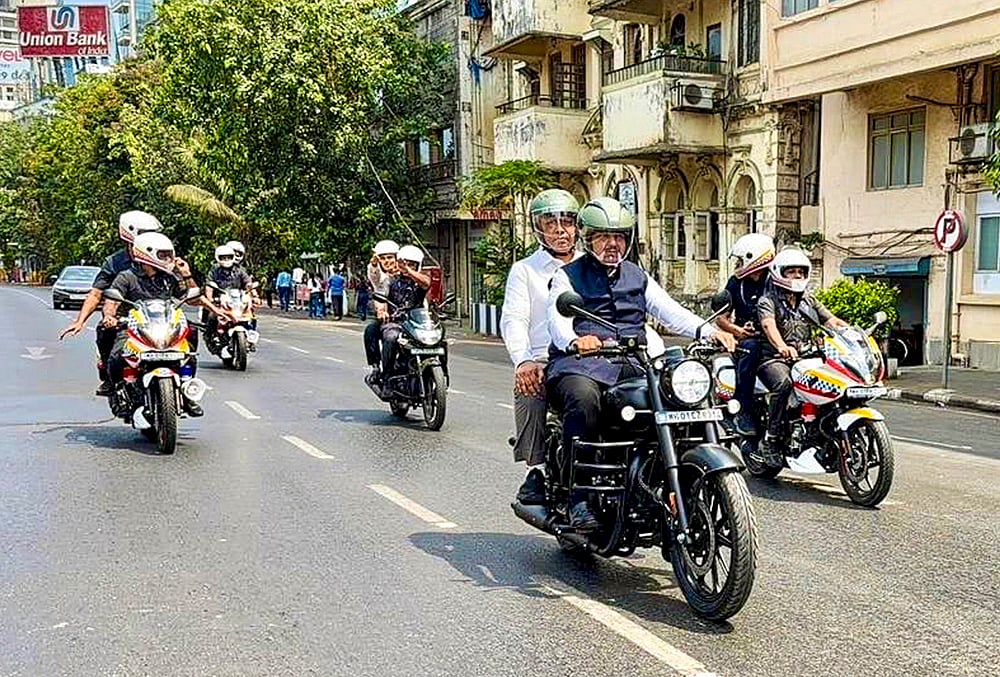 Maha CM Fadnavis rides a two-wheeler