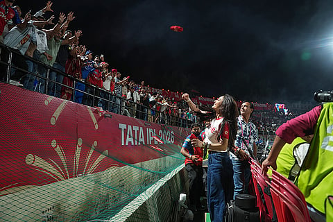 Punjab Kings' co-owner and actor Preity Zinta greets supporters during an Indian Premier League (IPL) 2026 T20 cricket match between Punjab Kings and Mumbai Indians, in Dharamshala, Himachal Pradesh.