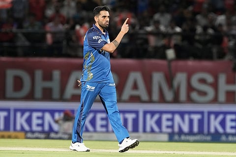 Mumbai Indians' Deepak Chahar celebrates the dismissal of Punjab Kings' Priyansh Arya during the Indian Premier League cricket match between Punjab Kings and Mumbai Indians in Dharamshala, India.