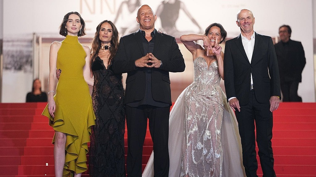 Meadow Walker, from left, Jordana Brewster, Vin Diesel, Michelle Rodriguez and producer Neal H. Moritz pose for photographers upon arrival for the 25th anniversary of the film 'The Fast and the Furious' at the 79th international film festival, Cannes, southern France, Thursday, May 14, 2026.  - (Photo by Scott A Garfitt/Invision/AP)