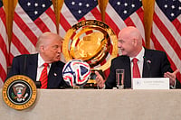 FIFA World Cup 2026, The Other Preview: Trump Politics, American Heat, And The Ultimate Betrayal | Photo: AP/Mark Schiefelbein : President Donald Trump and FIFA President Gianni Infantino talk during a FIFA task force meeting in the East Room of the White House, May 6, 2025, in Washington.