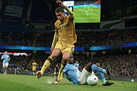 | Photo: AP/Ian Hodgson : Crystal Palace's Brennan Johnson, front, and Manchester City's Marc Guehi challenge for the ball during the English Premier League soccer match between Manchester City and Crystal Palace in Manchester, England.