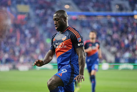 FC Cincinnati forward Kévin Denkey celebrates after scoring a penalty kick goal during the first half of an MLS soccer game against Inter Miami CF, in Cincinnati. 