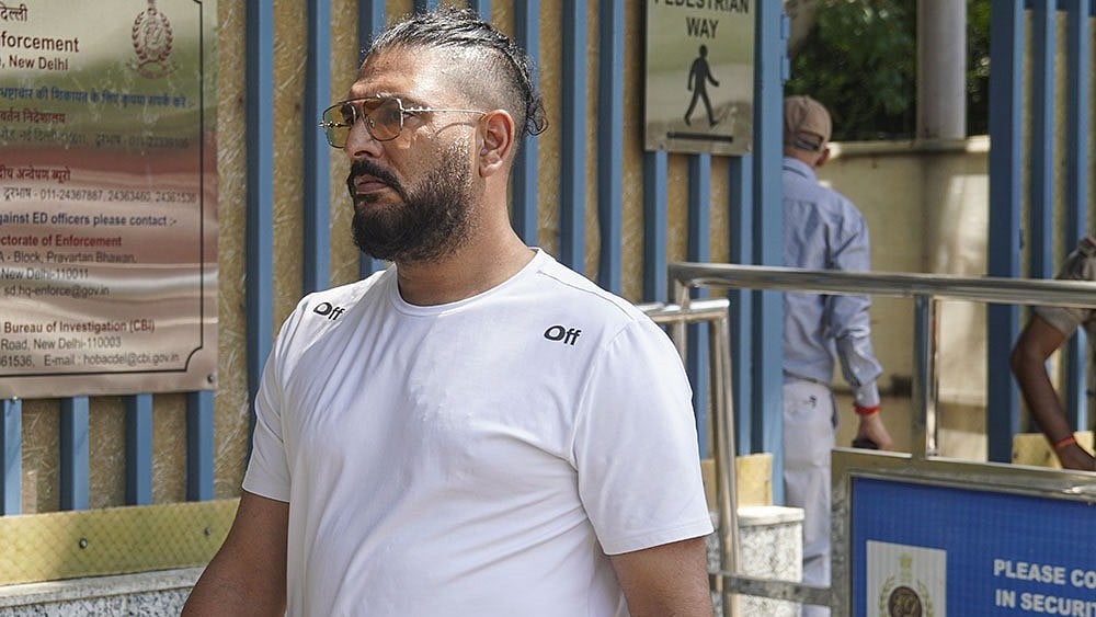 Former cricketer Yuvraj Singh arrives to appear before the Enforcement Directorate (ED) for questioning in a money laundering case linked to an online betting app named 1xBet, in New Delhi - Photo: PTI