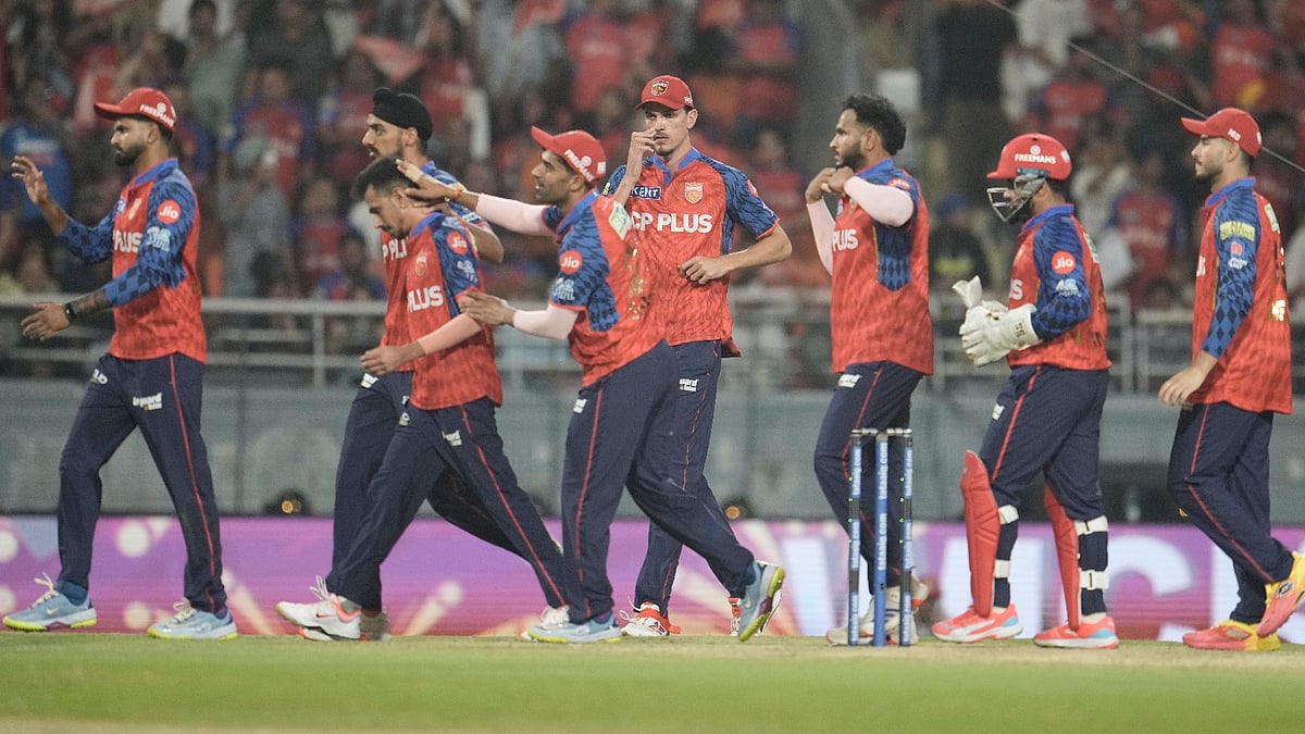 AP Photo : Punjab Kings' Yuzvendra Chahal , second from left, celebrates with teammates the wicket of Gujarat Titans' captain Shubman Gill during the Indian Premier League cricket match between Gujarat Titans and Punjab Kings in New Chandigarh, India, Tuesday, March 31, 2026