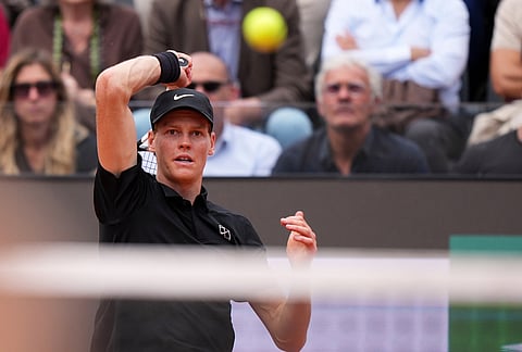 Italy's Jannik Sinner returns the ball to Andrey Rublev, during their match at the Italian Open tennis tournament in Rome.