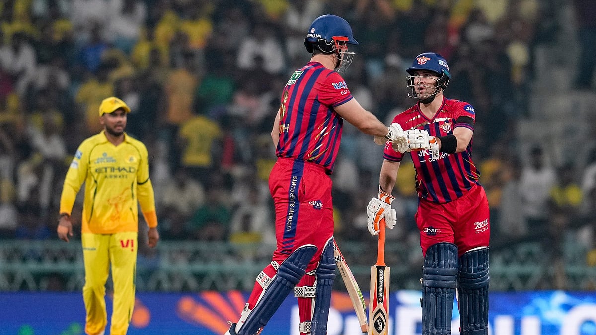 Lucknow Super Giants' Mitchell Marsh, front left, and Josh Inglis greet each other between the wickets during an Indian Premier League (IPL) 2026 T20 cricket match between Lucknow Super Giants and Chennai Super Kings, in Lucknow, Uttar Pradesh, Friday, May 15, 2026. - AP Photo/Arun Sharma