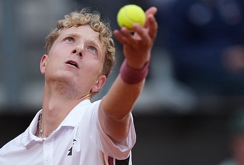 Spain's Martin Landaluce serves a ball to Daniil Medvedev, during their match at the Italian Open tennis tournament in Rome.
