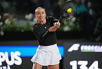 | Photo: AP/Andrew Medichini : Ukraine's Elina Svitolina returns the ball to Poland's Iga Swiatek during their match at the Italian Open tennis tournament in Rome.